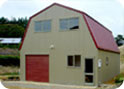 Quaker Barn with Vertical Cladding
